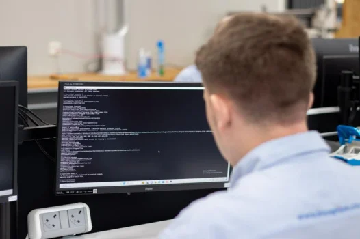 man using computer for coding