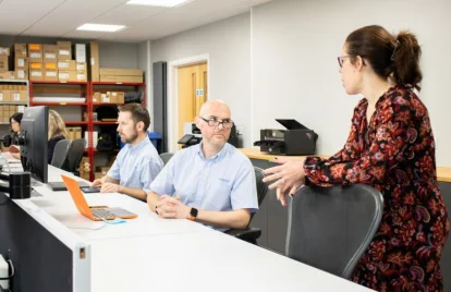 team meeting at desk