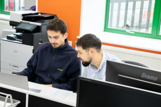 two men at desk